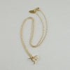 dainty gold hummingbird necklace
